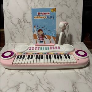 Pink Kids Keyboard with Microphone and Songbook